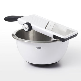 OXO Good Grips mandoline slicer non-slip handle and base for stable slicing.