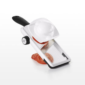 OXO Good Grips mandoline slicer slicing directly over a bowl for easy prep.