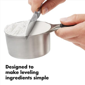 Magnetic cups stay together for tidy storage and quick removal of one cup