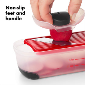 OXO Good Grips food holder protects hands during slicing