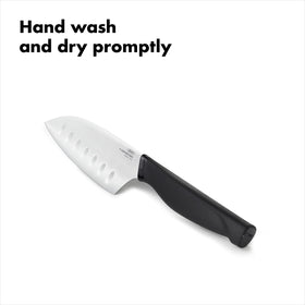 OXO Good Grips Mini Santoku Knife slicing small vegetables.