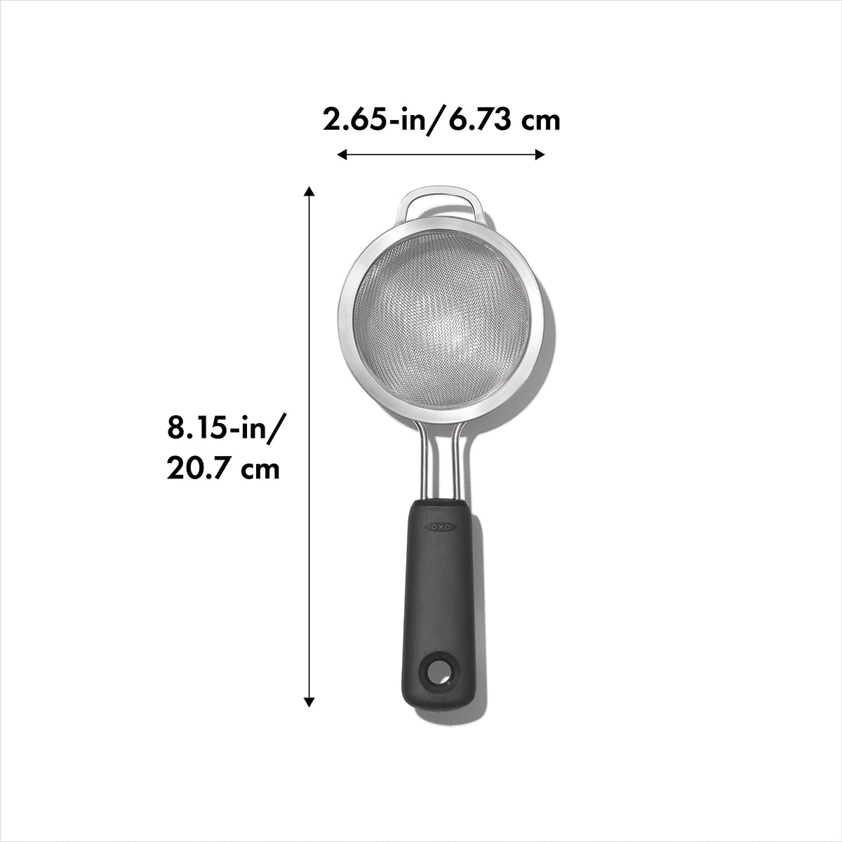 OXO Good Grips Strainer secure loop resting over a mug
