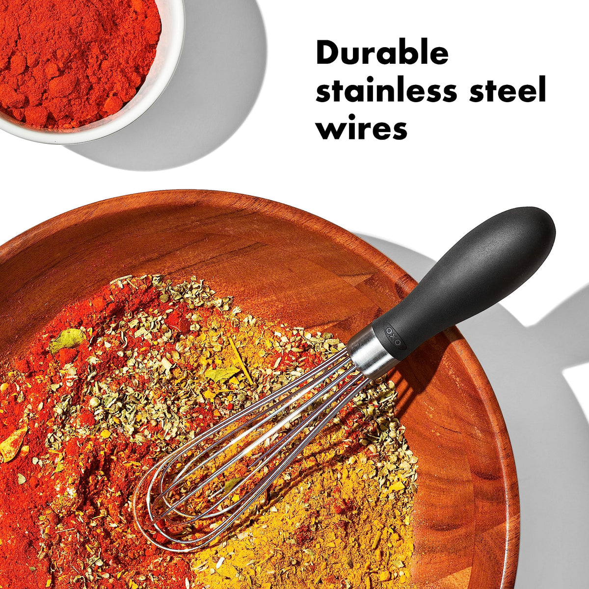 OXO Good Grips Mini Whisk in a jar for quick salad dressing.