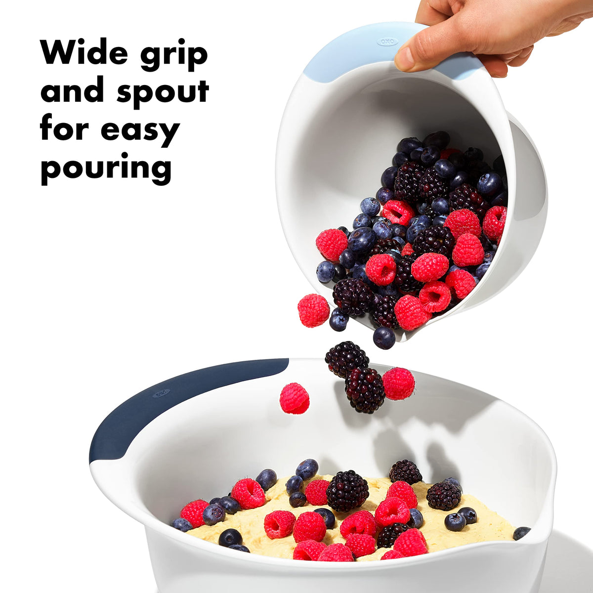Blueberry OXO mixing bowls shown with a wide pour spout for easy ingredient transfer.