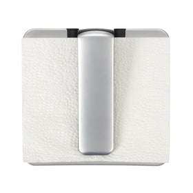 OXO Good Grips napkin holder arm folds flat into base for compact storage.