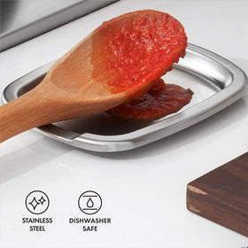 Spoon rest used sideways to hold multiple utensils at once