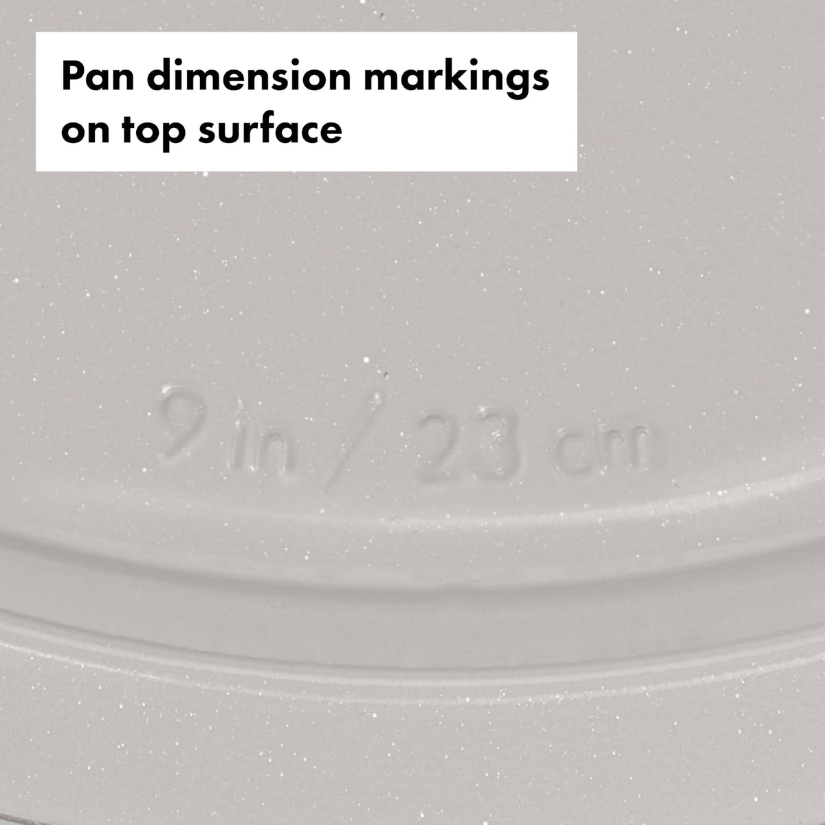 OXO Good Grips cake pan with wide rim for secure handling.