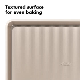 Square rolled edges of the OXO Good Grips pan provide a secure grip for transfers.
