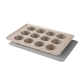 OXO Good Grips nonstick pro muffin pan showing twelve cups for even baking and easy release