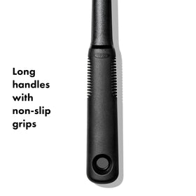 OXO Good Grips nylon slotted spoon, heat-ready up to 400°F, safe for non-stick cookware.