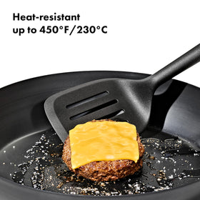OXO nylon turner with soft non-slip handle for comfortable cooking.