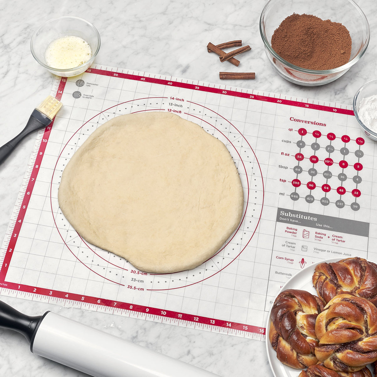 OXO Good Grips pastry mat measures 17.58 by 24.58 inches.