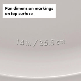 OXO Good Grips pizza pan with rounded interior corners for easy cleaning