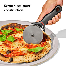 OXO Good Grips pizza pan top surface showing dimension markings for quick size id