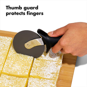 OXO Good Grips pizza wheel offers large non-slip handle for steady slicing.