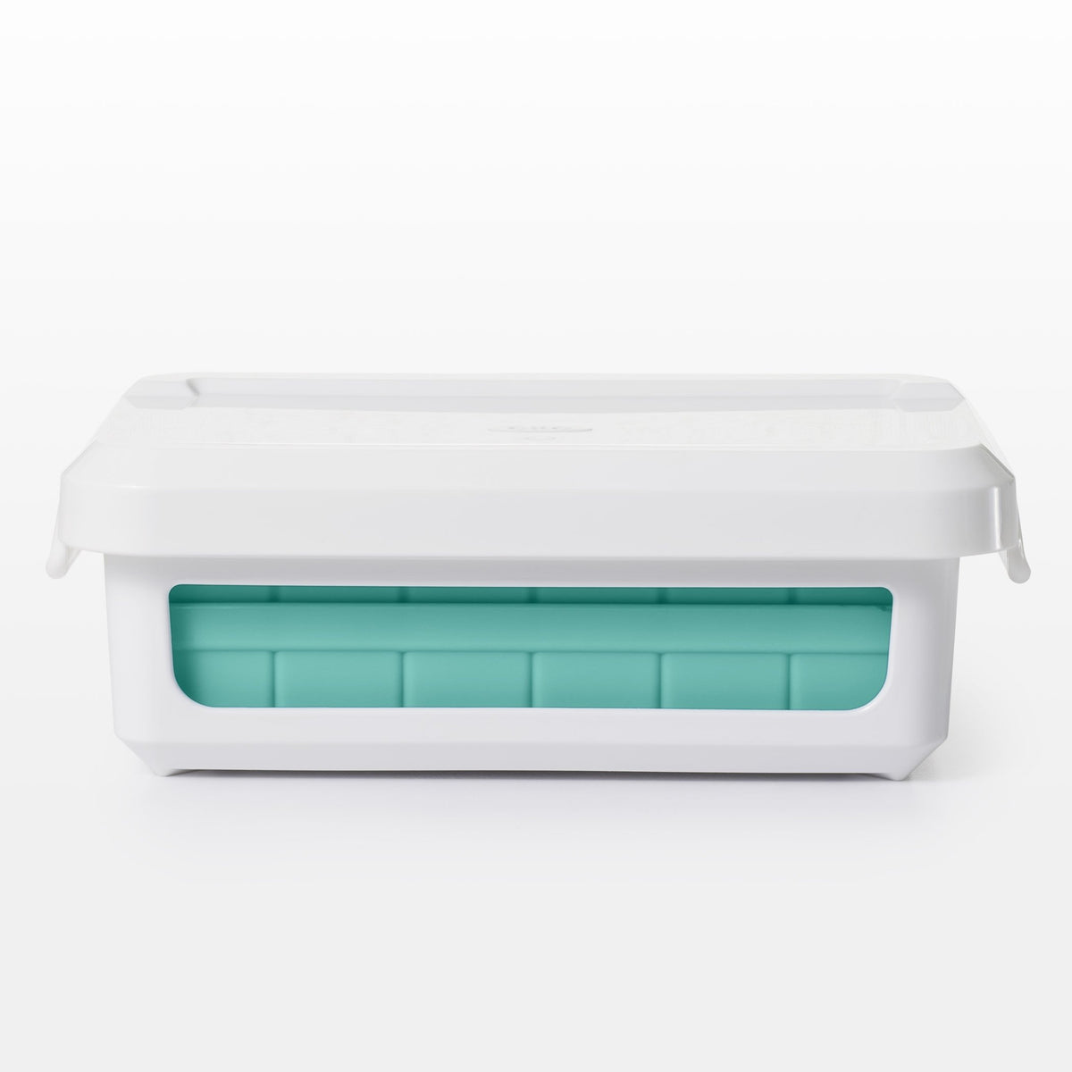 OXO Good Grips plastic base supports the tray during filling and freezing