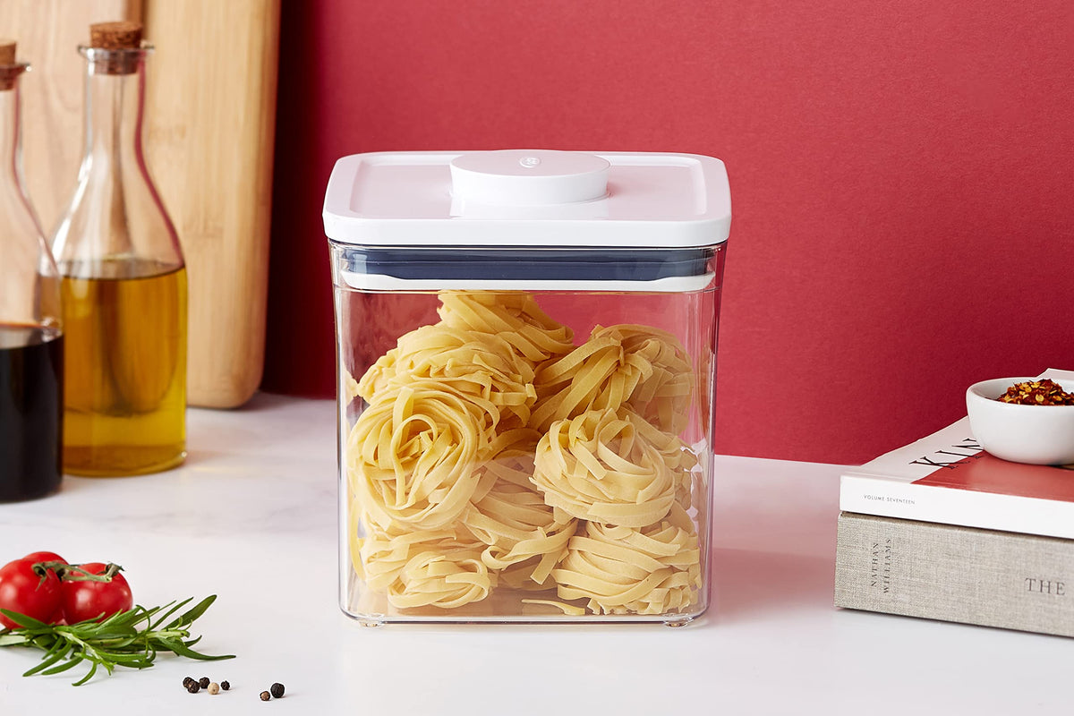 Big square short POP container saving cabinet space while storing staples.
