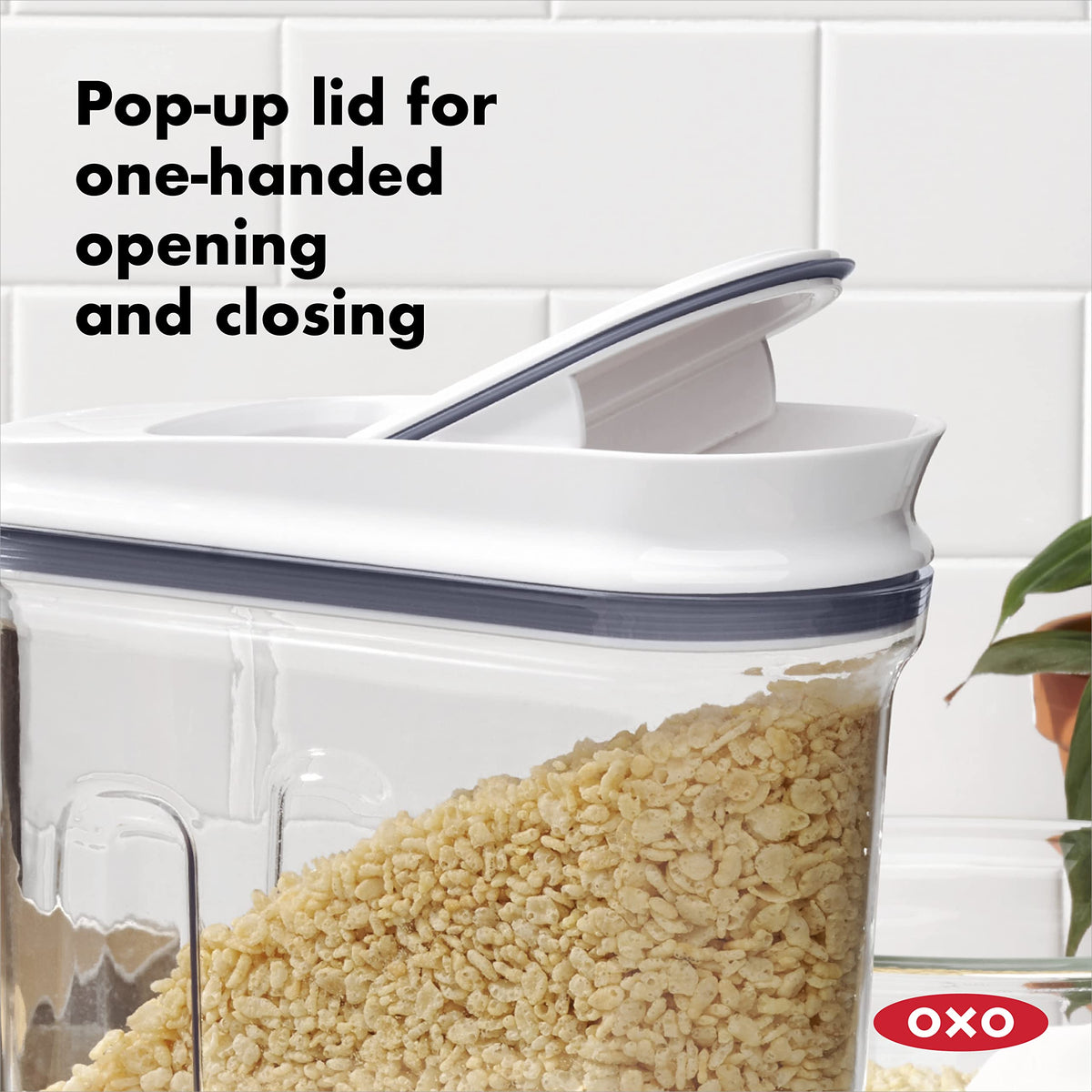 OXO Good Grips POP cereal dispensers showing one-handed lid operation for easy access.