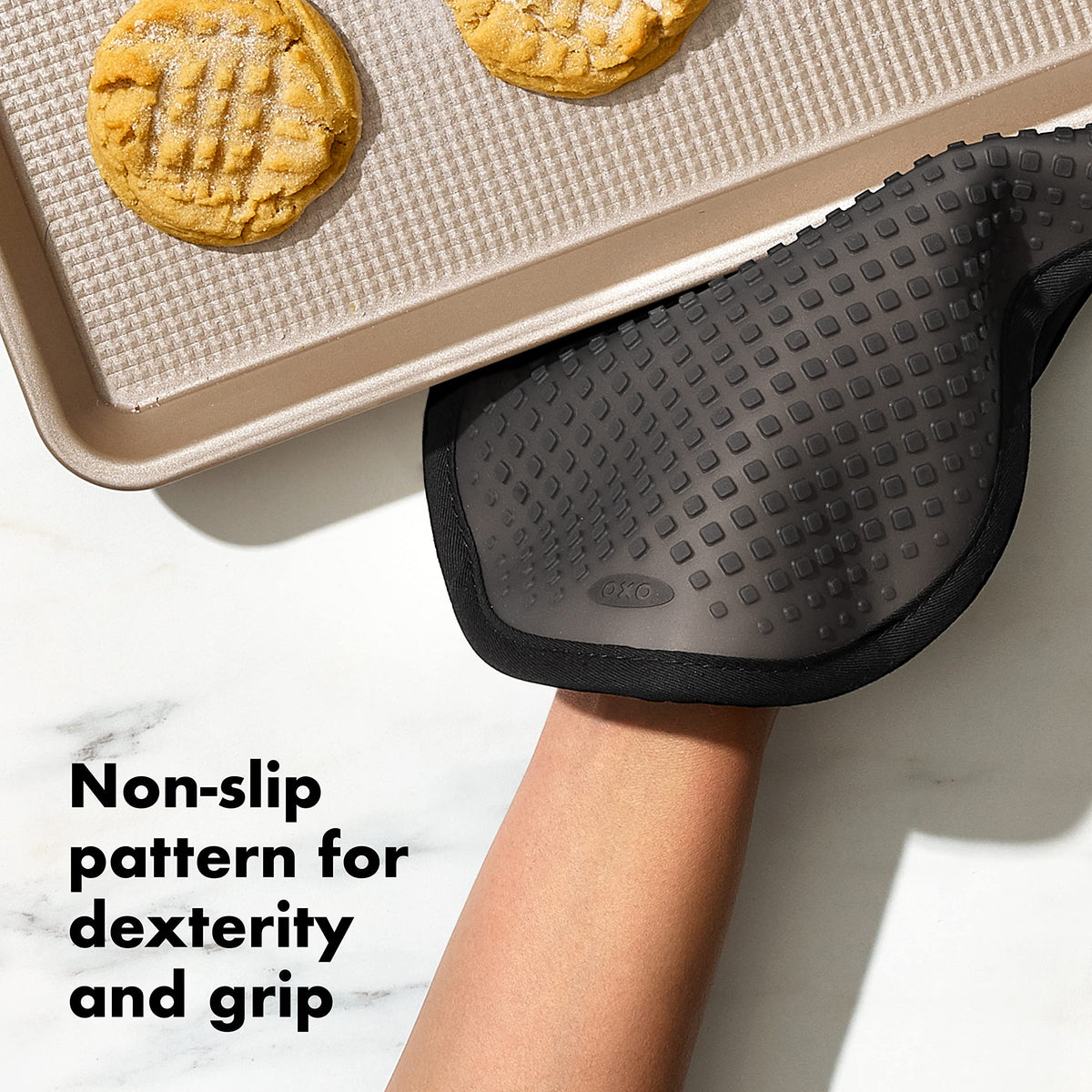OXO Good Grips pot holder back pocket offers easy on/off and extra insulation