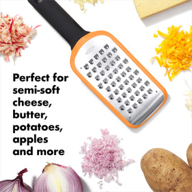 OXO Good Grips grating potatoes and cheese efficiently