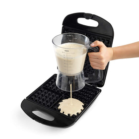 OXO Good Grips batter dispenser lid doubles as drip tray between squeezes