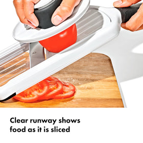 OXO Good Grips Precision Handheld Mandoline thickness tab for easy size changes and consistent slices