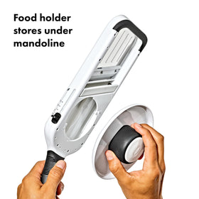 OXO Good Grips Precision Handheld Mandoline stored underneath to keep kitchen neat