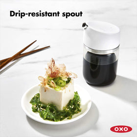 OXO Good Grips Precision Pour Dispenser on a clean counter ready for cooking tasks