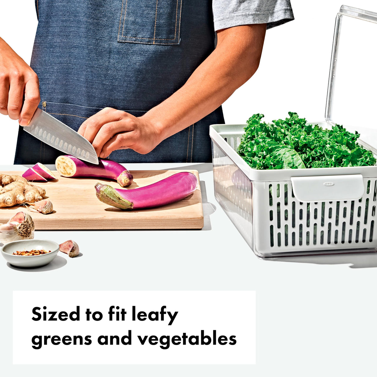 OXO Good Grips Produce Saver adjustable divider keeps produce organized.