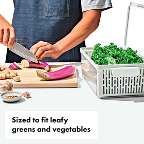 OXO Good Grips Produce Saver adjustable divider keeps produce organized.