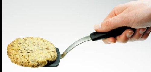 OXO Good Grips silicone cookie spatula stainless steel core detail for stable use.