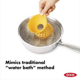 OXO egg poacher shows water-fill lines on the side for proper level
