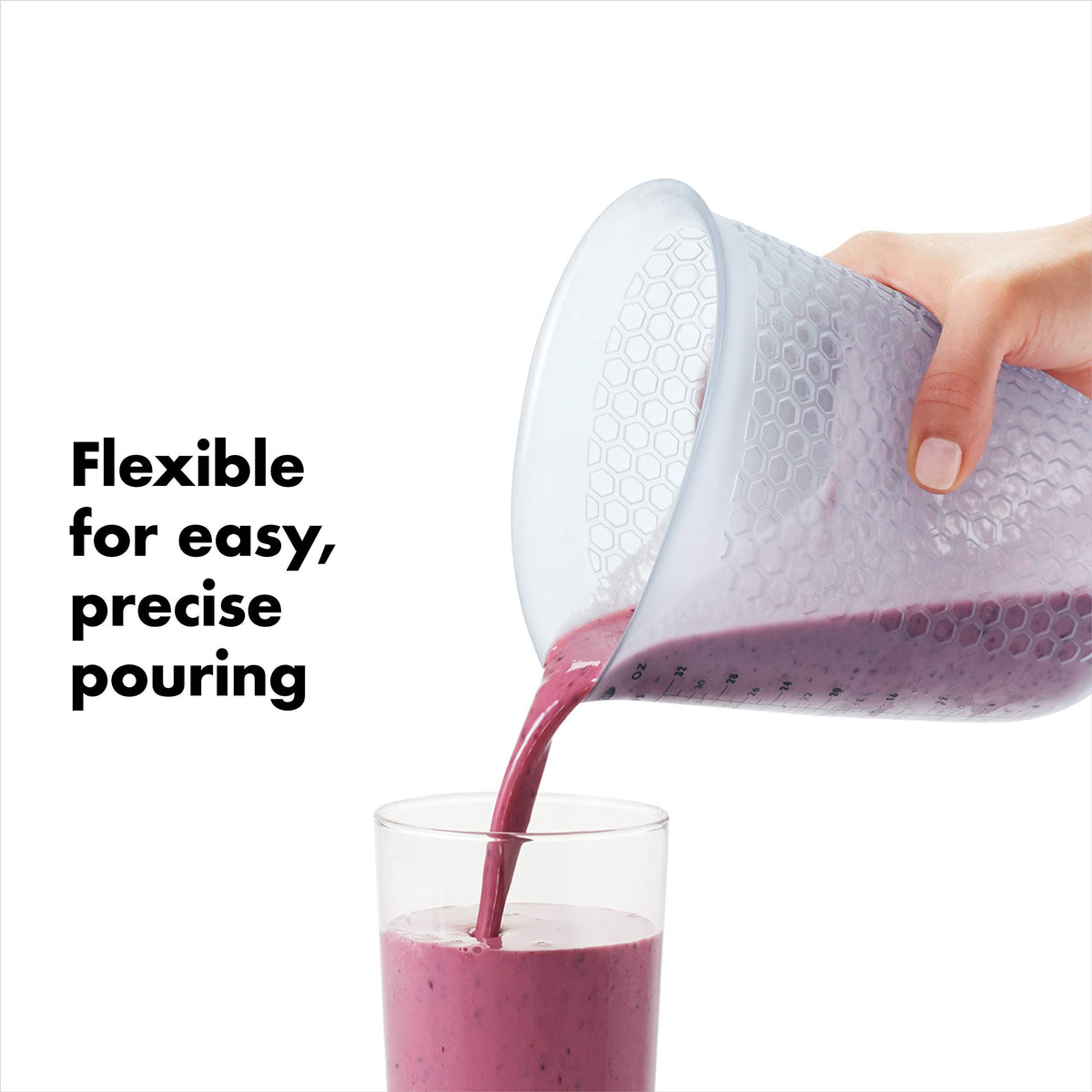 OXO Good Grips flexible silicone body for easy squeezing and narrow pour spout.