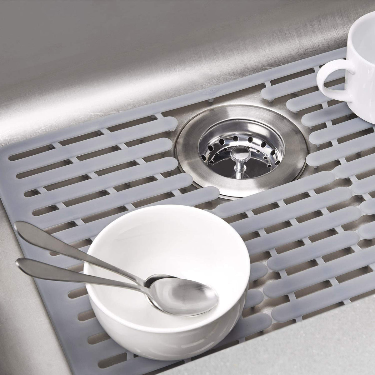 OXO silicone sink mat is heat-safe and dishwasher-safe for versatile use