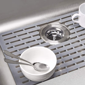 OXO silicone sink mat is heat-safe and dishwasher-safe for versatile use