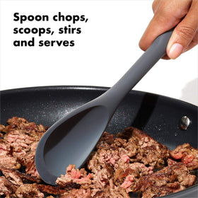 OXO Good Grips silicone utensil edge close-up shows flexible edge capturing every drop.