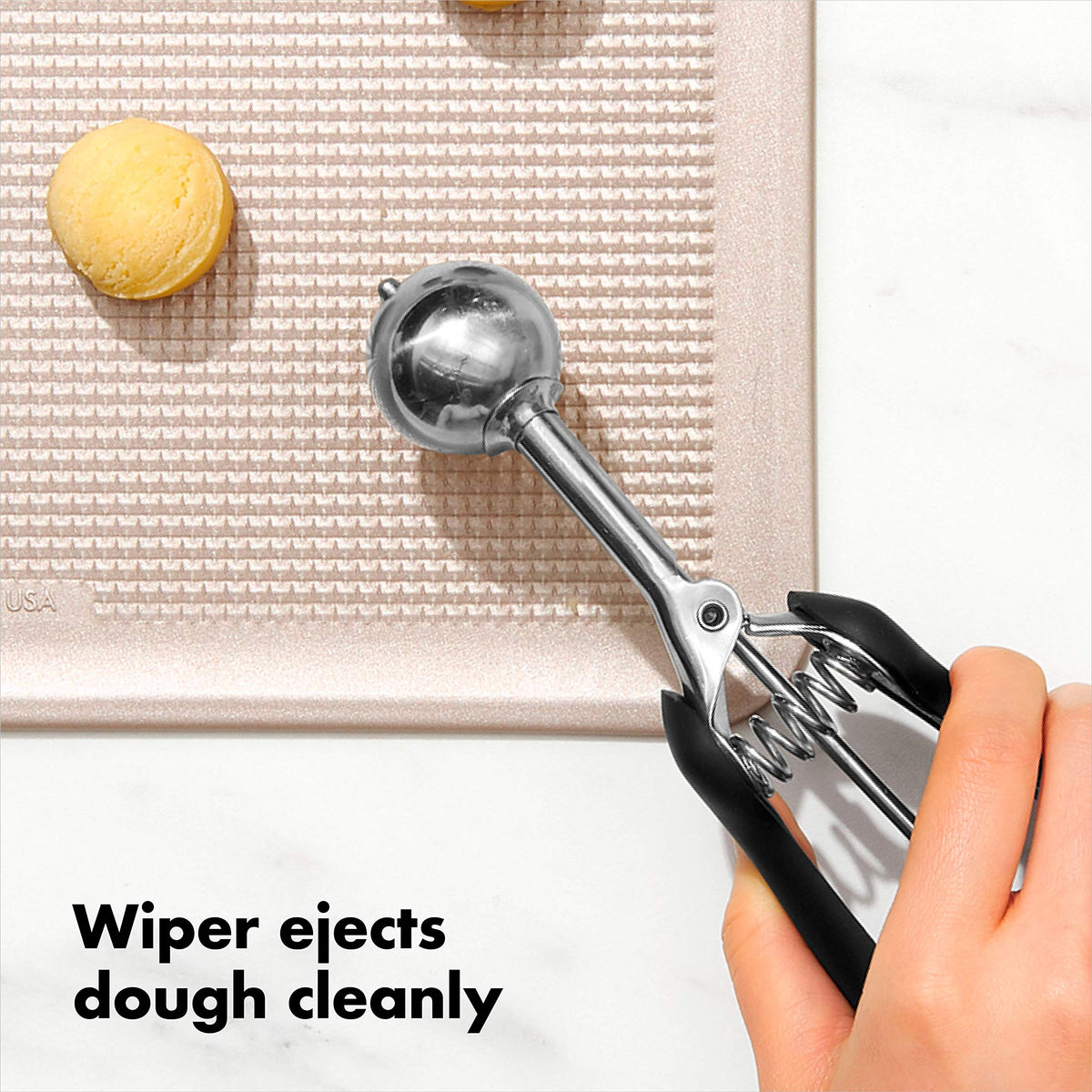 OXO Good Grips small cookie scoop compact design.
