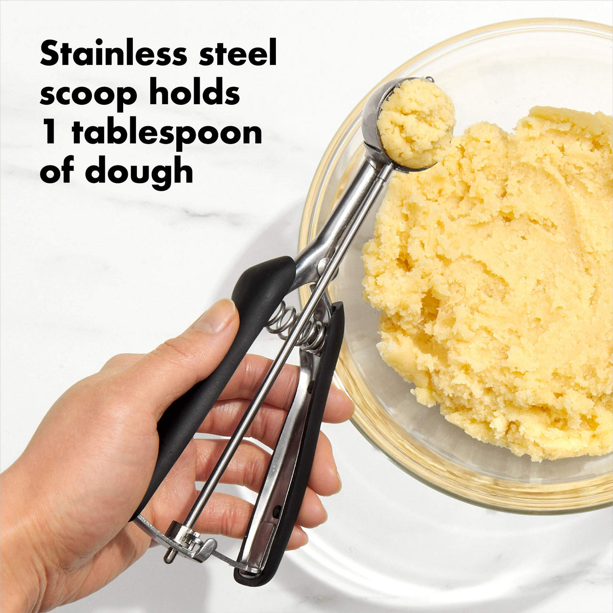 OXO Good Grips small cookie scoop dough-release action.