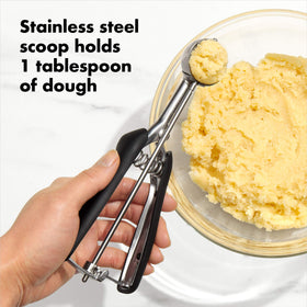 OXO Good Grips small cookie scoop dough-release action.