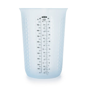 OXO Good Grips silicone measuring cup squeeze-pour for precise butter pouring.