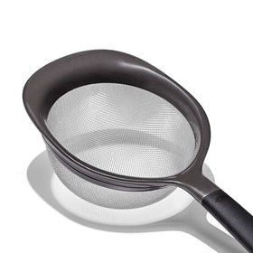 OXO Good Grips wide rims keep strainers stable over bowls.