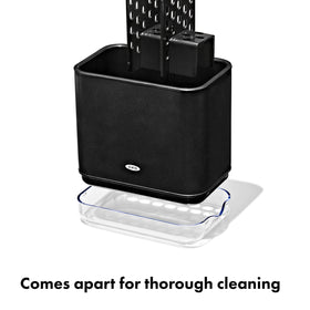 OXO Good Grips sink caddy drip tray with pour spout for easy water drainage.