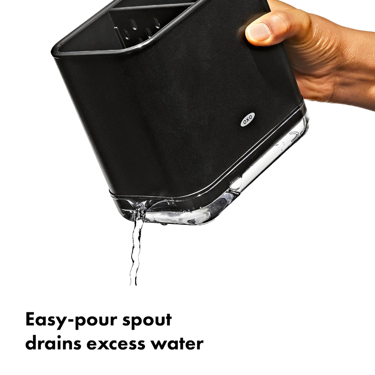 OXO Good Grips sink caddy with two sponges and two brushes neatly organized.