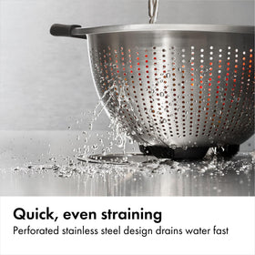 OXO Good Grips colander nests inside mixing bowls for compact storage.