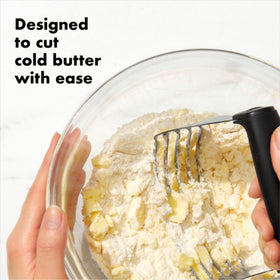 OXO Good Grips dough blender handle close-up highlighting soft non-slip grip for comfort