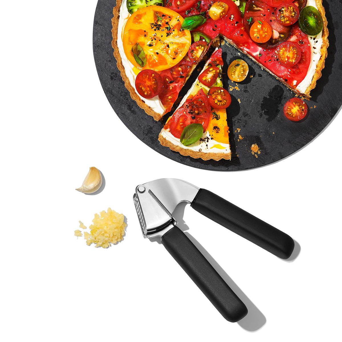 Soft, comfortable handles on the OXO garlic press reduce strain during squeezing.