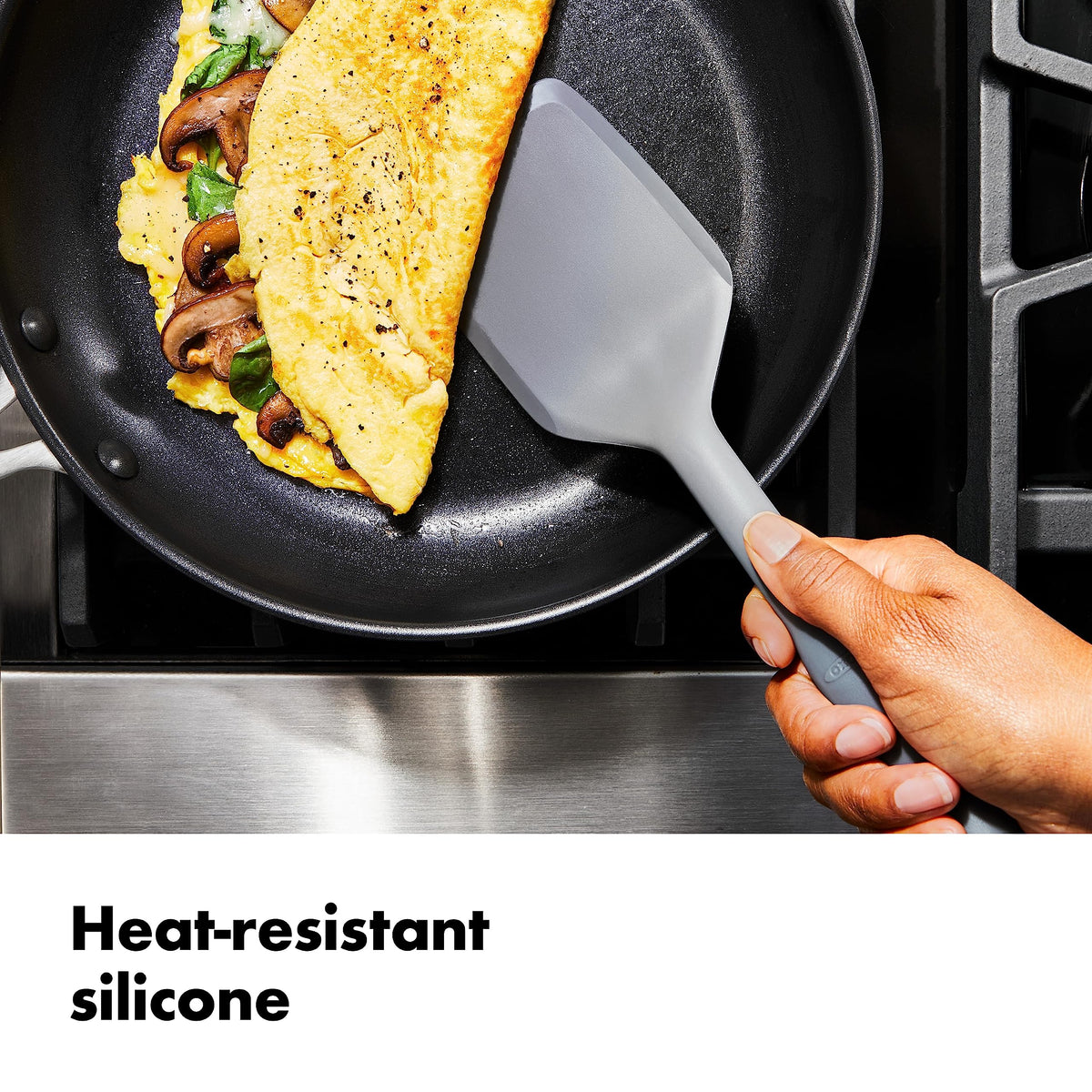 OXO 12-inch stainless steel tongs with silicone heads for easy flipping