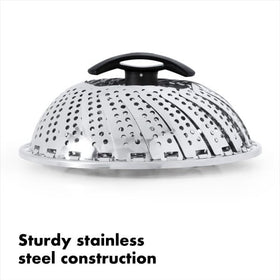 OXO Good Grips steamer with retracted handle fits under pot lids during steaming