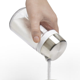 OXO Good Grips sugar dispenser with stainless steel accents on countertop