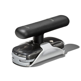 OXO Good Grips Twisting Jar Opener with Base Pad on counter shows non-slip stability for easy opening.